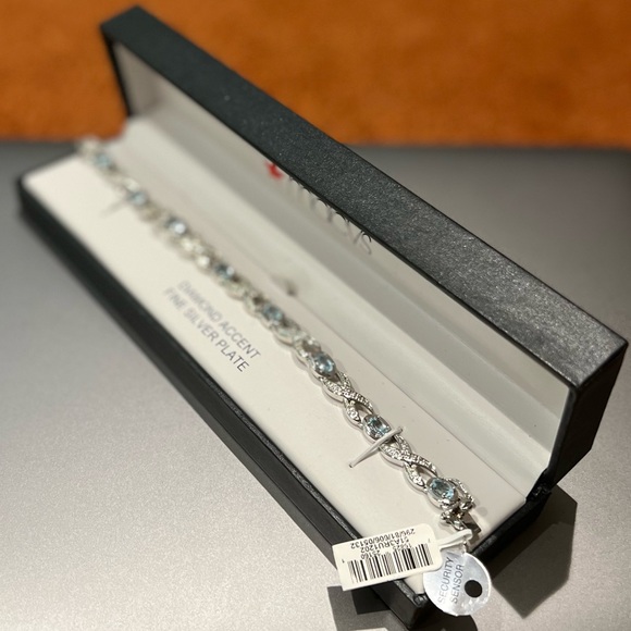 Silver Blue Topaz Infinity Bracelet - Picture 3 of 6